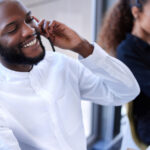 Man working at a U.S based answering service center