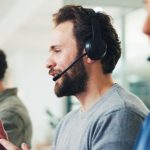 contact center, business man and consulting for help, feedback or quality assurance. call monitoring specialist, team and agent speaking for crm compliance, customer service or support for coworking