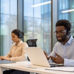 customer support team using laptops and headsets in modern office environment. focused on communication, teamwork, assistance. suitable for business, technology, and online service themes.